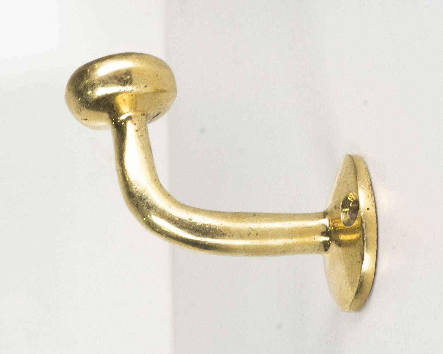 Set of Handcrafted Unlacquered Brass Hooks For Wall