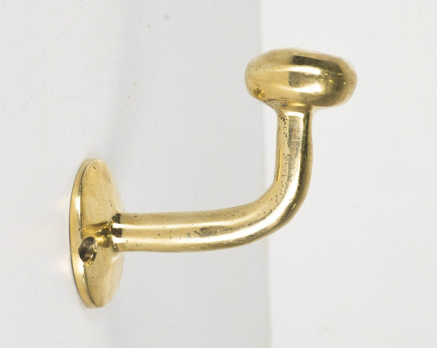 Set of Handcrafted Unlacquered Brass Hooks For Wall
