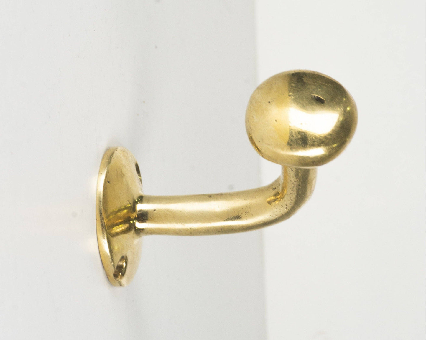 Set of Handcrafted Unlacquered Brass Hooks For Wall